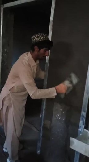 How he doing wall plaster at night time #construction #work #shortsfeed