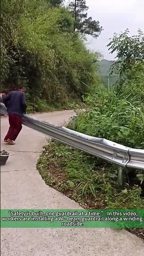 Workers Installing W - Beam Guardrail: Road Safety Upgrade