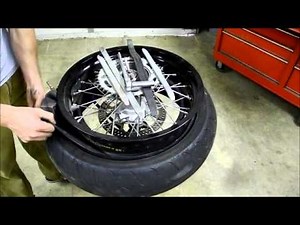 Changing Motorcycle Tires Using Manual Tire Tools