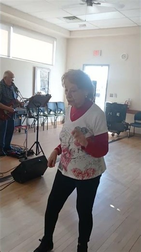 Alice Sjogren dancing to Margaritaville Jimmy Buffett by Milagro at NothValleySeniorCenter Albuquerq