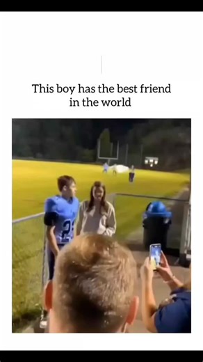 DEEP SINGH on Instagram: "The Instagram reel showcases a 17-second video of a teenage football player in a blue uniform tenderly hugging and posing for selfies with a girl by a field fence, capturing a joyful post-game moment that resonates as wholesome romance disguised as friendship. , a positivity-focused account with 2.3k likes and 156k views in under two months, the clip aligns with its bio's goal of combating anxiety through feel-good content, drawing comparisons to viral "best friend" tro