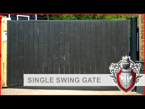 Budget Automatic Swing Gate With Wooden Slats by Art Metal Workshop