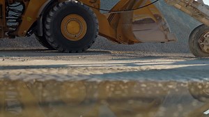 Why do operators love the new purpose-built two-pass Cat® 982 XE? Built-in technology. A bigger cab. Greater visibility. | Cat Construction