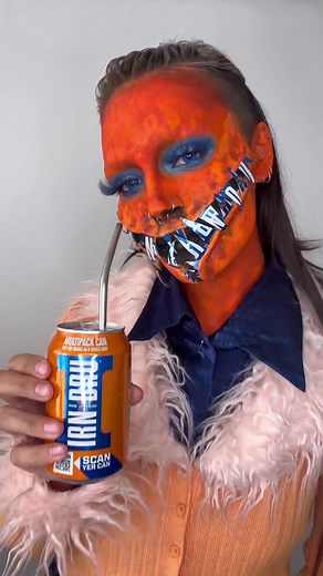 AD This Halloween, @IRN-BRU wanted me to show my creative flair and get inspired by the iconic original can! Join the #YouAsABru campaign and unleash your inner #irnbru alter ego 🧡💙 #halloween #halloweenmakeup #fyp #foryoupage #creativemakeup #specialeffectsmakeup #sfxmua