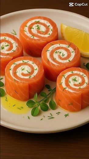 Elegance on a plate 🐟✨Smoked salmon & cream cheese roulade — brunch never looked this good!”