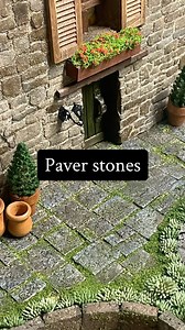 To achieve a realistic paver stones effect using acrylic paint, follow these steps: 1. Apply a base coat of brown (raw umber)acrylic paint to the surface and allow it to dry completely. 2. Sponge brush the surface with milky white paint to create highlights, focusing on the raised areas of the paver stones. 3. Using a paint sponge, apply navy blue paint to the surface. The blue paint will add depth and realism to the paver stones. 4. After the blue paint has dried, lightly sponge on light gray p