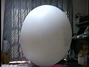 Giant weather balloon pop