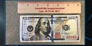 Three people charged after counterfeit bills passed around