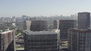 a modern district of designer brick houses in the central district of Moscow. modern brick high-rise buildings. filmed in the color profile D-log. aerial view