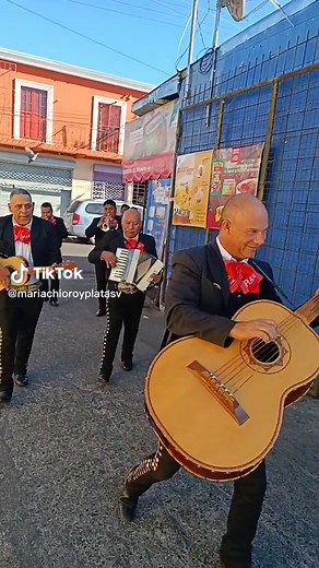 Traditional Mariachi Performance in Colorful Street Setting