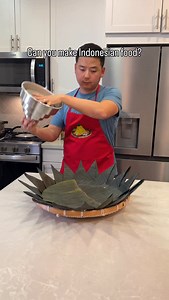 897K views · 152K reactions | First time trying Indonesian food. This entire plate presentation is called a nasi tumpeng (correct me if I'm wrong) and the dishes I made were: Nasi Kuning - yellow rice Beef Rendang - beef curry Telur Balado - spicy eggs Ayam Goreng - fried chicken Tempe Orek - tempeh green beans Sate ayam - chicken sate | POV Husband | Facebook