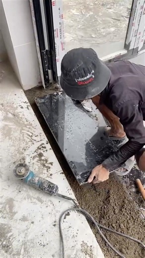 Stone cladding for the three-story staircase #shorts #construction #constructiontips #building #fyp