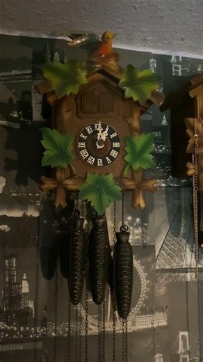 Vintage Black Forest musical double door cuckoo clock.