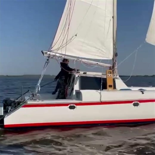 Woods Wizard overtakes us on the Lauwersmeer. #sailing #catamaran #multihull #boating #sailboat