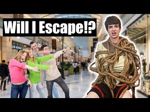 I Let Strangers Put Me in a Straight Jacket IN PUBLIC (Escape Challenge)
