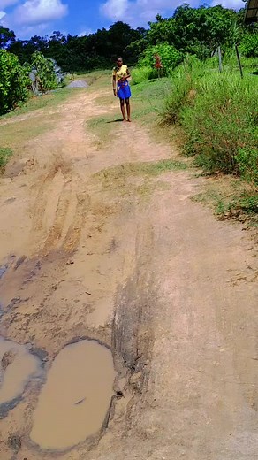 Playful Splashing in Puddle: Joyful Outdoor Moment