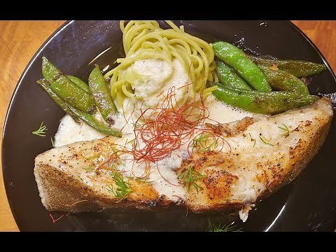 Halibut steak 2.0 sous vide with spaghetti, beans and white wine sauce