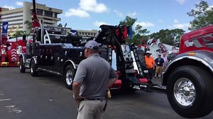 Brother to brother - A 50-ton Century lifts a 50-ton Vulcan. Miller Industries Florida Tow Show. | Tow Times Magazine