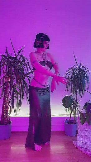 Rachael Redfern, an illustrious fusion dancer hailing from Russia, is a true luminary in the realm of tribal fusion belly dance. With captivating performances that blend the essence of belly dance and Arabic dance, she weaves a mesmerizing tapestry of movements that leave audiences in awe. Rachael's journey into the world of dance commenced in belly dance classes, where her profound connection with this ancient art form blossomed. Her dance is a seamless fusion of styles, effortlessly transition