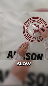 Make adorable Santa sacks for Christmas using your Cricut! Iron on your design to a cotton canvas bag for a festive touch. A simple and fun project to get you in the holiday spirit. Download the free SVG file from my shop! #SantaSacks #Cricut #DIYChristmas #ChristmasCrafts #HolidayDIY https://thecraftyblogstalker.com/personalized-santa-sacks-free-svg/ | The Crafty Blog Stalker