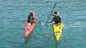 Draw stroke in a sea kayak