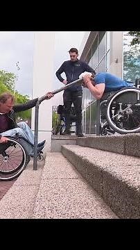 Wheelies during wheelchair skills course