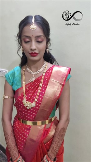 Infinity beauties by Karishma Harihar on Instagram: "Dolled up pretty @keerthana.krishnaaa28 for family event . . . DM for bookings #infinitybeauties #makeup #eyemakeup #traditionalbraids #curl"