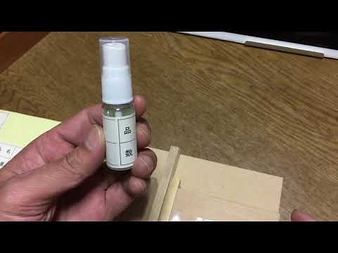 シール貼り 応用編 裏ワザ シールの裏貼り 治具 シールくるりん テスト。手作業 手加工 内職で、ボトルにシールを貼る。