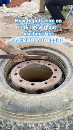 How to put a tire on the rim without machine.Tire installation struggles. #skills #video #shorts