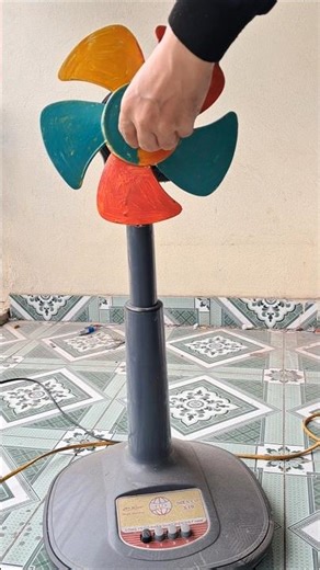 Installing colorful custom blades on an electric fan and the result