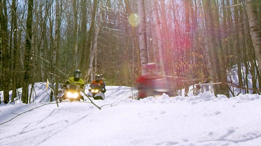 Get your adrenaline pumping with an exciting snowmobile ride through New Hampshire’s wilderness. | VisitNH - New Hampshire
