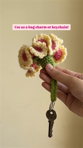 Aishwarya Deepak on Instagram: "‘Carnation’ for tutorial link in DM! Crochet Carnation Keychain Tutorial !!⬇️ This has to be one of the prettiest keychains I have made so far. Carnations are such pretty flowers and wouldn’t it be amazing if you can have one with yourself all the time! 💗💚 ▶️Youtube video and pattern: Gail Cabreira If you cant find the video, let me know in the comments and I will send you a DIRECT link! It can be used as bag charm or a keychain. It uses basic stitches like dc a