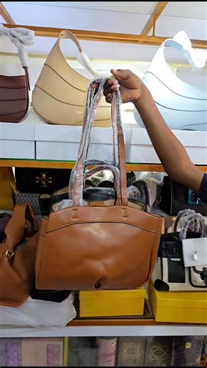 Tweenies_clothes and bags seller in lagos. on Instagram: "New inn🔥🔥 Classy bags Colours= brown and black Price=23k"