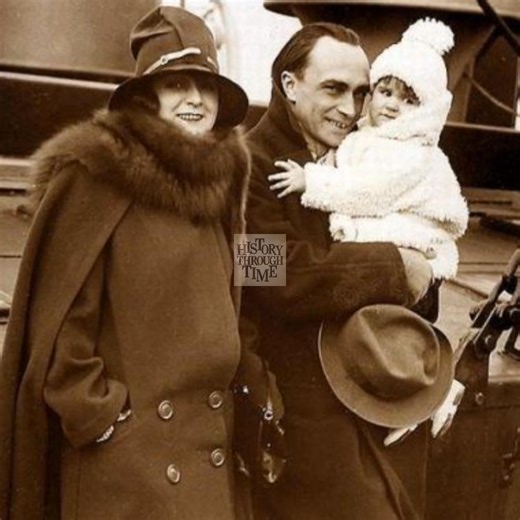 "Circa 1927, German actor Conrad Veidt and his second wife, Felizitas Radke, were photographed aboard a ship bound for England with their young daughter, Vera. Veidt, already acclaimed for his unforgettable performance in The Cabinet of Dr. Caligari (1920), carried the stature of one of Germany’s leading silent film stars as he looked toward new opportunities in British cinema. Felizitas, poised and graceful, stood proudly at his side, while little Vera added warmth to the family portrait. This 