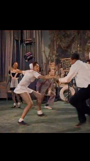 Hollywood Diversity on Instagram: "Probably the greatest Lindy hop sequence ever filmed starring “Whitey’s Lindy Hoppers” from the 1941 film Helzapoppin’ (Colorized with DeOldify). Whitey’s Lindy Hoppers was a professional swing dance group formed in Harlem in the late 1920s by Herbert “Whitey” White (nicknamed “Whitey” for the white streak in his hair), a former boxer who became a bouncer at the Savoy Ballroom, the top ballroom of the Swing Era in Harlem, New York. The Savoy Ballroom was the fi