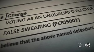 Tampa woman receives a sample ballot after being arrested for voter fraud