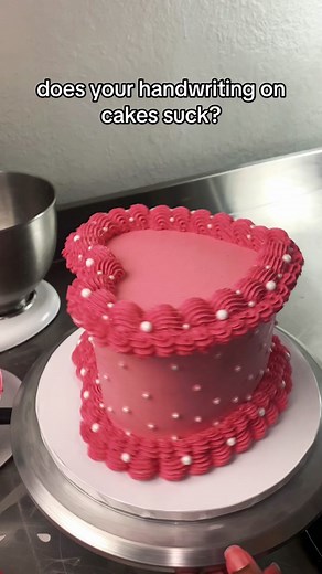 The easiest way to level up the messages on your cake? Just let your Cricut or Silhouette do the work for you! Some use cardstock, some use frosting paper - both are good options. Here’s a video of me placing a frosting paper message on a cake! #bakedexp #cakedecorating #caketips #caketok #baketok #homebaker #heartcake #cakehack