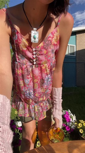 potting plants with a bottle of wine