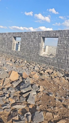 Building a Stone Wall: Construction Site Insights