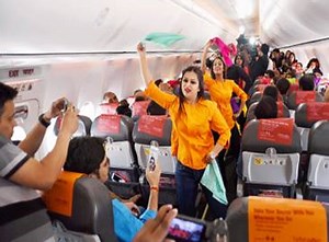#ICYMI SpiceJet crew dances to celebrate Holi with on-board passengers #Happy_Holi | The Times of India