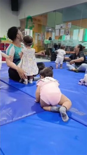 Teteh is the bravest in playgroup and can follow instructions, then asks her teacher for a cuddle