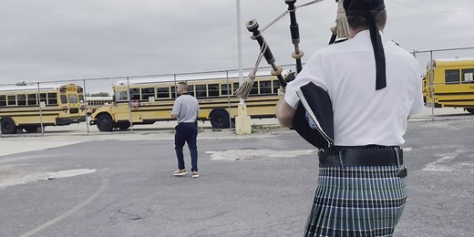 A bagpiper’s visit as part of a senior prank brings joy to high school