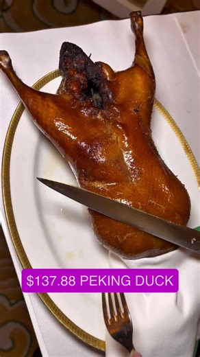 Imperial Peking Duck at Wing Lei at Wynn is top tier at $137.88! This signature dish is carved tableside and includes a choice of steamed buns or Mandarin crêpes, accompanied by duck consommé, cucumber, scallions, and a trio of hoisin sauces. Exceptionally juicy and the crispy skin is divine. | LasVegasFill