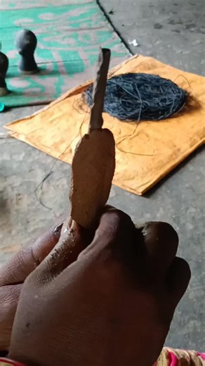 30 reactions | The artisan carefully applies clay over the wax model to create a strong mold. This clay layer helps to hold the wax design in shape and prepares it for the casting process in Dhokra art. #DhokraArt #TribalArt #ClayProcess #TraditionalCraft #HandmadeArt #LostWaxCasting #IndianArtisan #DhokraMaking #BrassCraft #artisanatwork | Real Dhokra | Facebook
