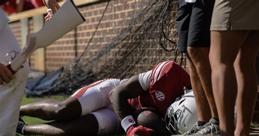 OU wide receiver Keontez Lewis collides with end zone wall, stretchered off field