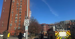 Crews battle high-rise apartment fire in Detroit