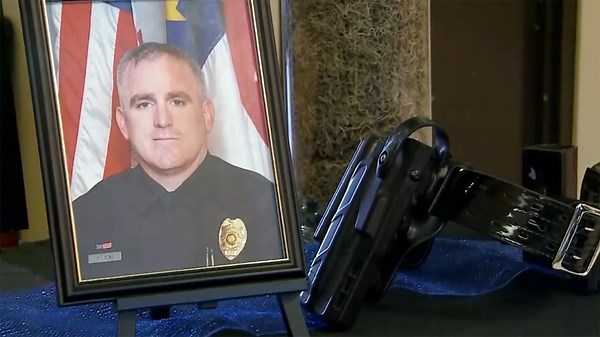 Suspect arrested after officer killed in North Carolina grocery store shooting