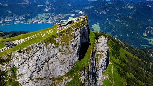 A mountain ridge with buildings on the edge