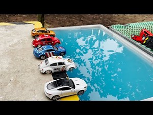 Watch Cars Fall In Blue Water