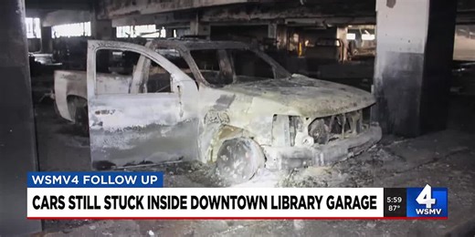 Cars still stuck inside downtown library garage